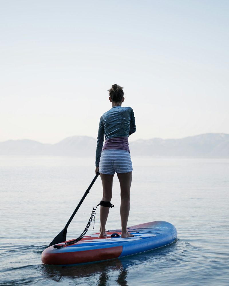 Woman paddling on sup board