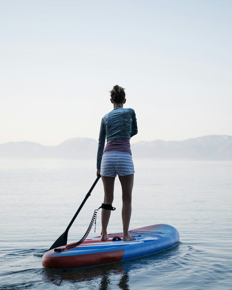 Woman paddling on sup board